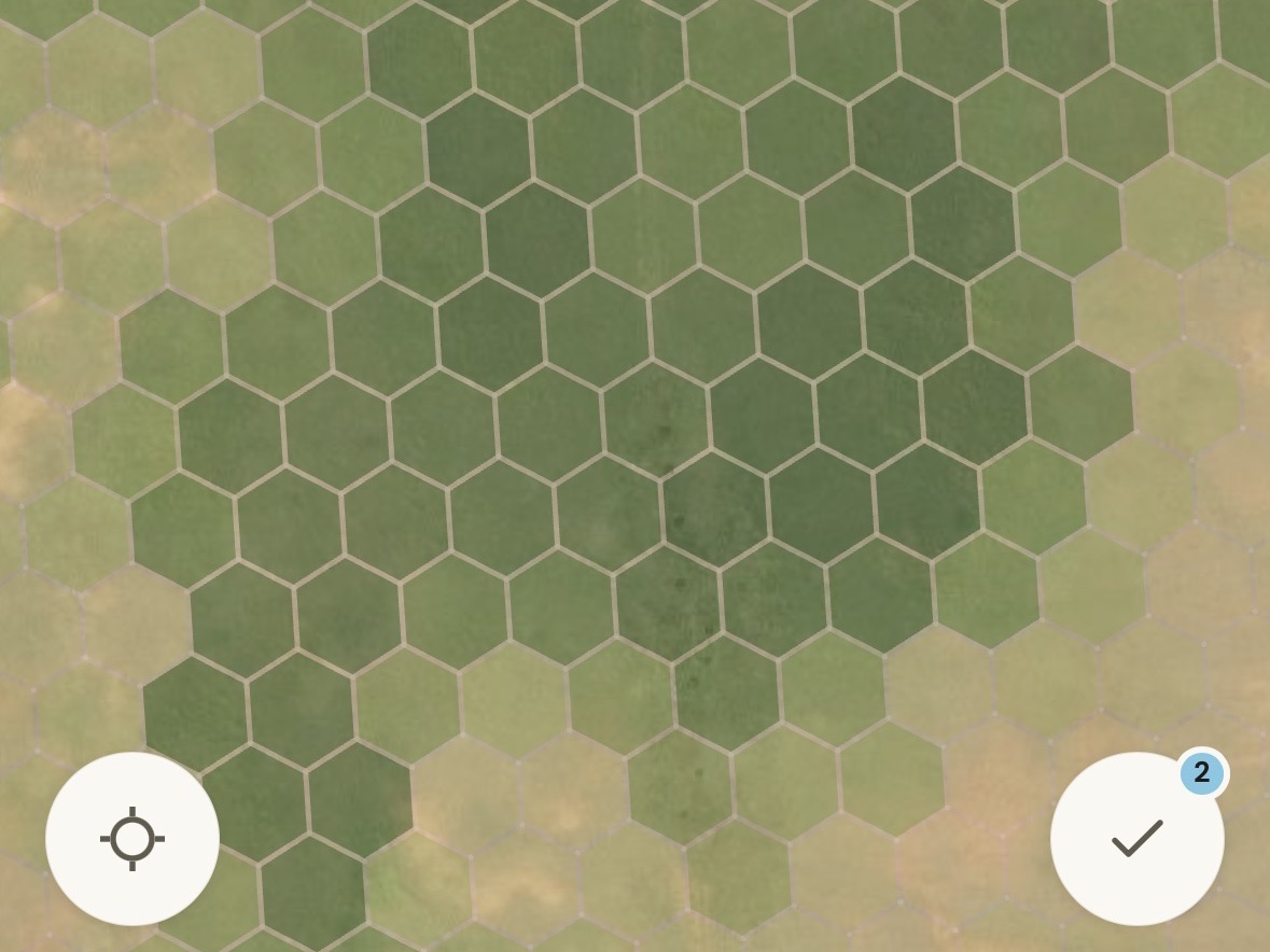 The Virtual Fence app showing pounds of standing grass per acre on a hex map of a ranch
